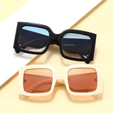 Jackie O UV400 Sunglasses with Cream Lenses.