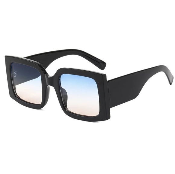 Jackie O UV400 Sunglasses With Blue lenses.