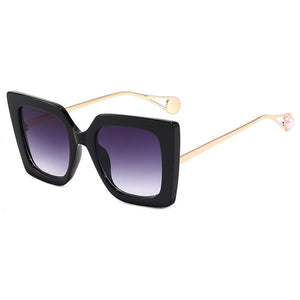 Coco UV400 Sunglasses With Gold And Pearl Frame. Purple Lenses