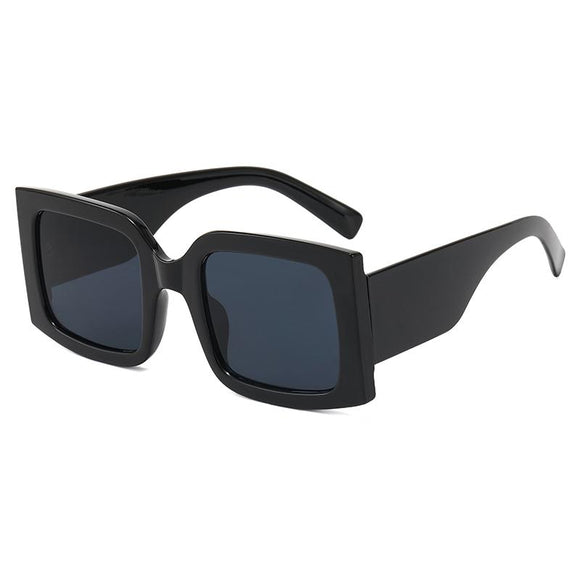 Jackie O UV400 Sunglasses With Black Lenses.