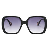 Sophia UV400 Sunglasses in black with purple graduating Lenses