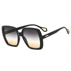 Sophia UV400 Sunglasses, Black Frame With Brown Graduating Lenses.